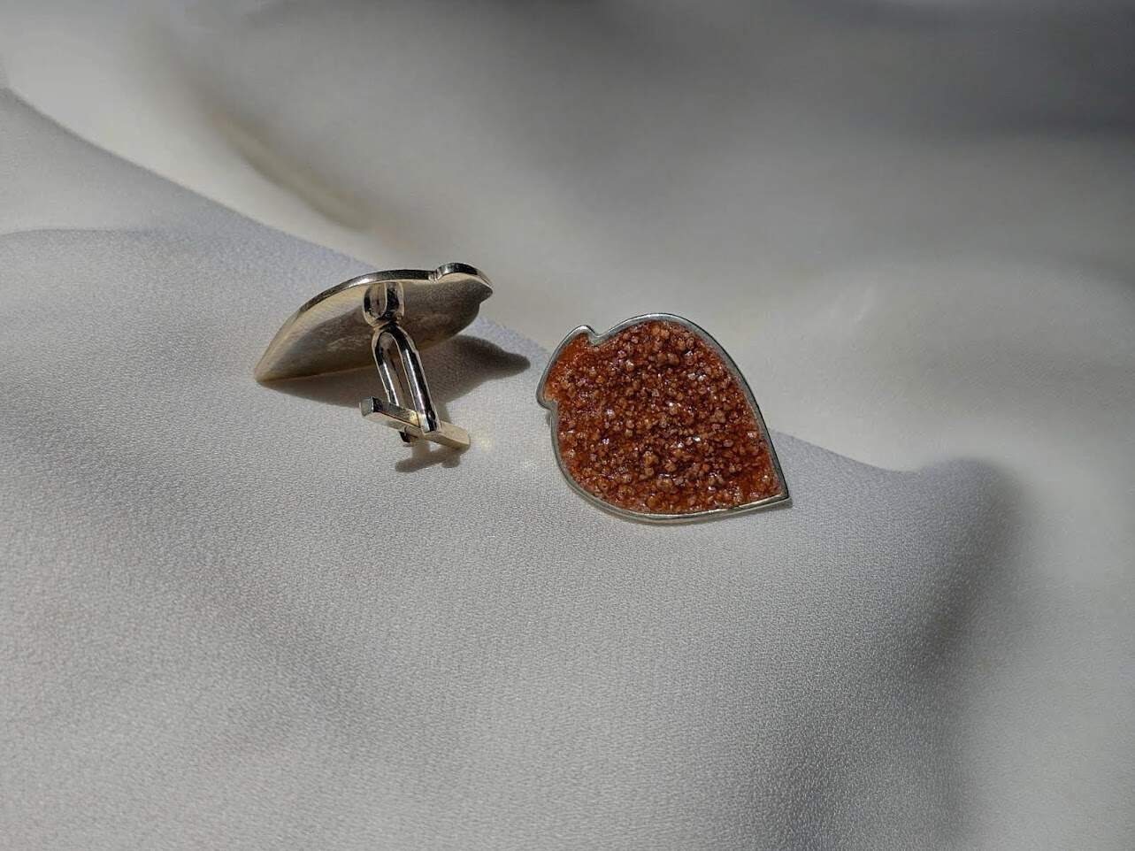 The author's cufflinks "Kvevri"
